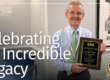 doctor smiling holding award