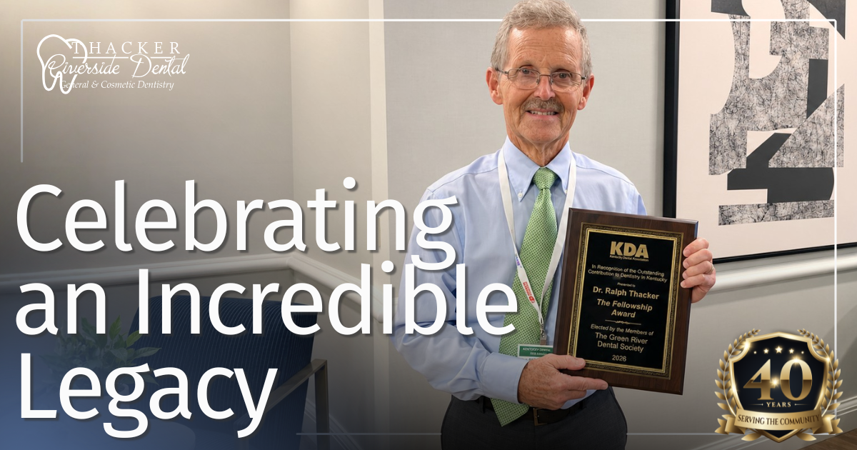 Celebrating an Incredible Legacy doctor smiling holding award